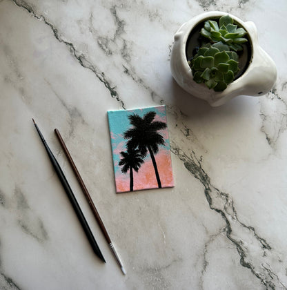 mini palm trees with easel