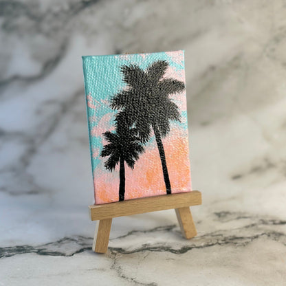 mini palm trees with easel